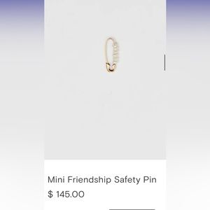 Loren Stewart pearl safety pin earring